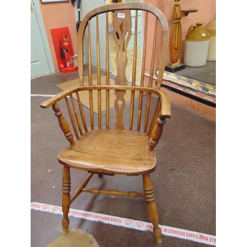 357 - 19th century Windsor chair, pierced splat back, solid seat, on turned supports and stretchers.