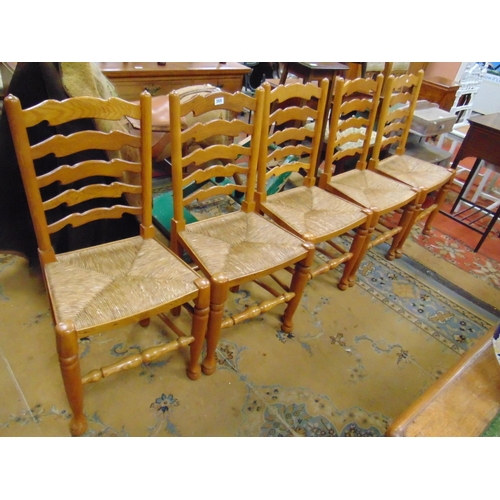 365 - Five reproduction ladder back country type chairs, basket weave seats, on turned supports and stretc... 