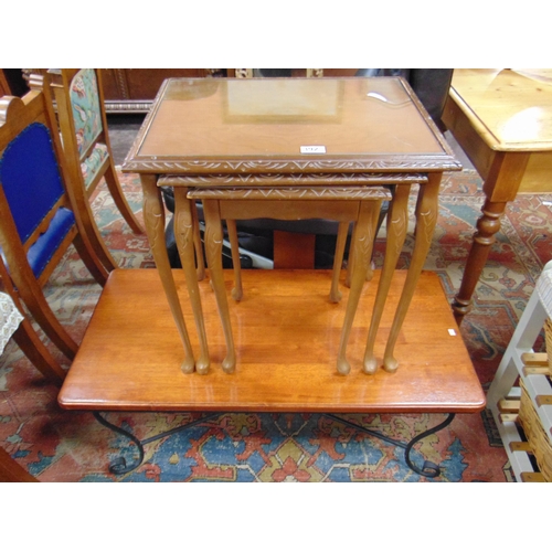 392 - Glass topped nest of three tables, together with a modern coffee table.