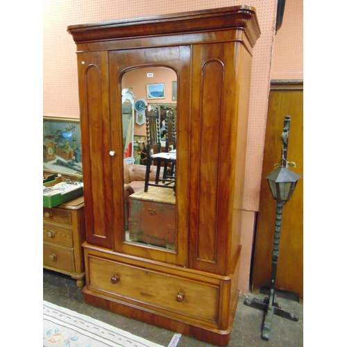 434 - Victorian mahogany wardrobe, ogive cornice above single mirrored door, and long drawer with knob han... 