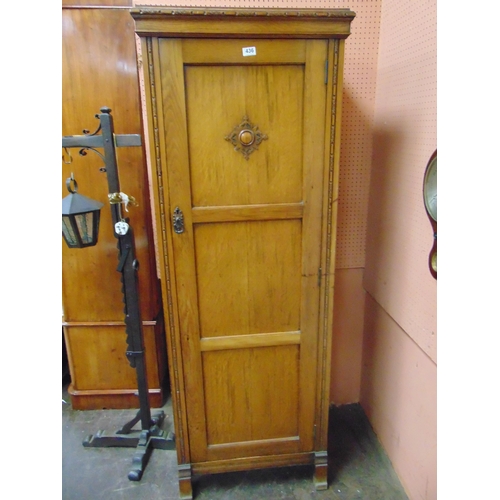 436 - An oak single door hall wardrobe. 70 x 25.5 x 19