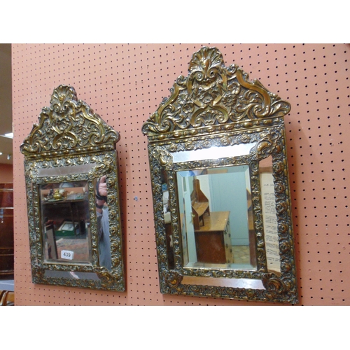 439 - Good pair of embossed brass five plate wall mirrors, each 23 x 13.5