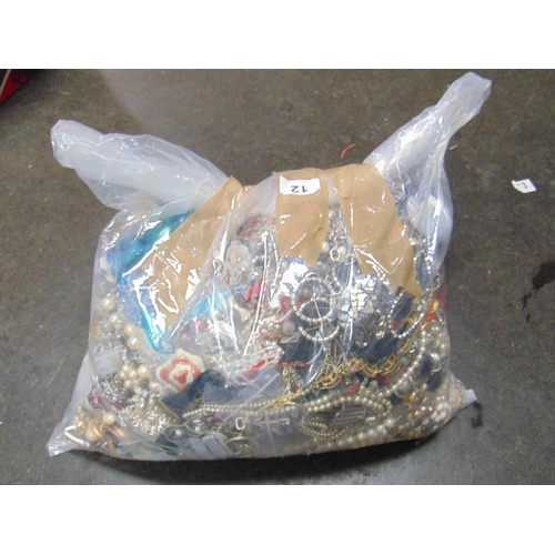 12 - 12 kilo bag of costume jewellery.