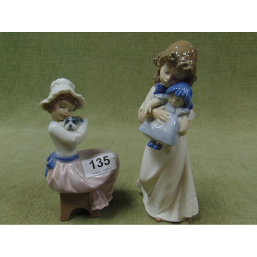 135 - Two Nao figurines.