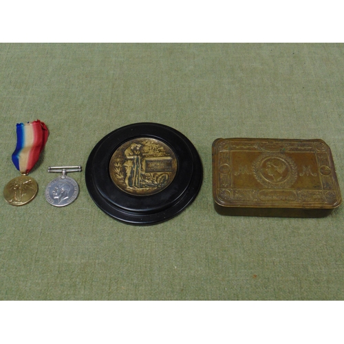 142 - Christmas 1914 Princess Mary tin, two first world war medals and a commemorative plaque.