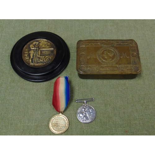 142 - Christmas 1914 Princess Mary tin, two first world war medals and a commemorative plaque.