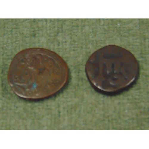 165 - Two old Indian copper coins.