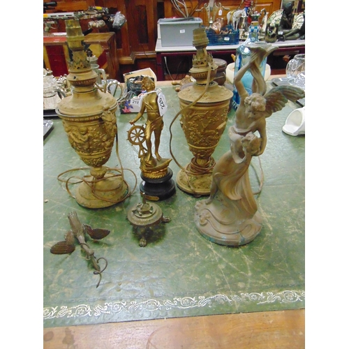 226 - Pair of gilt painted lamps, gilt metal figure and a figural candle holder.