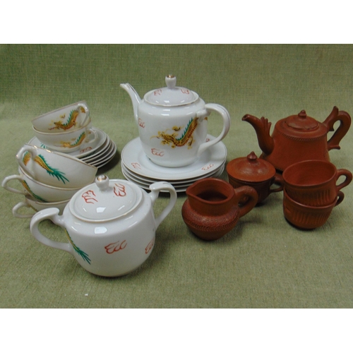 238 - Terracotta Oriental tea service, geisha girl tea set.