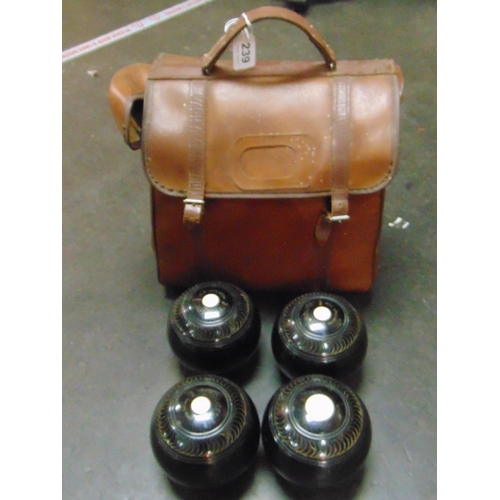 239 - Cased set of crown green bowls.