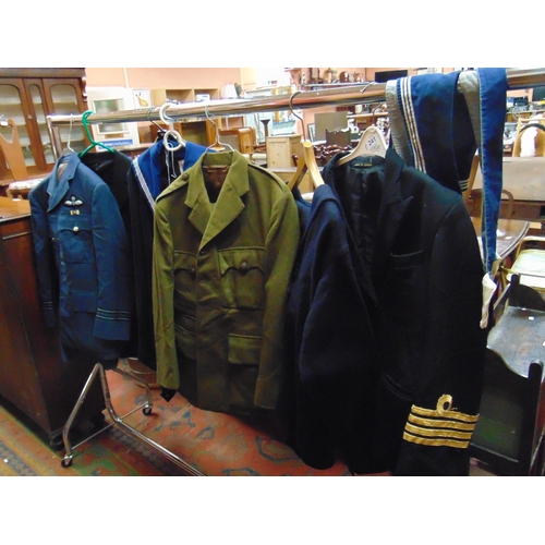 241 - Collection of military uniforms.