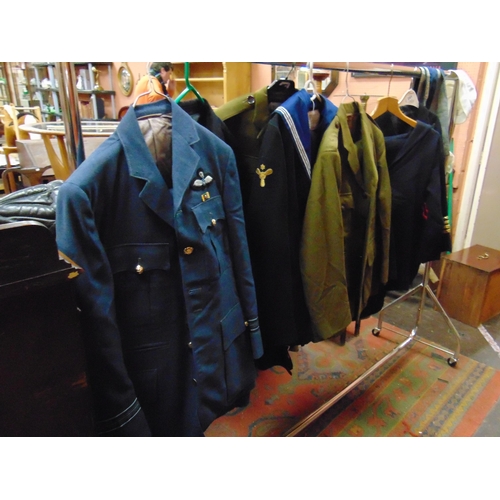 241 - Collection of military uniforms.