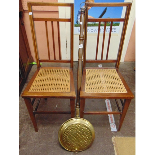 242 - Brass warming pan together with a pair of cane seated bedroom chairs. (3)