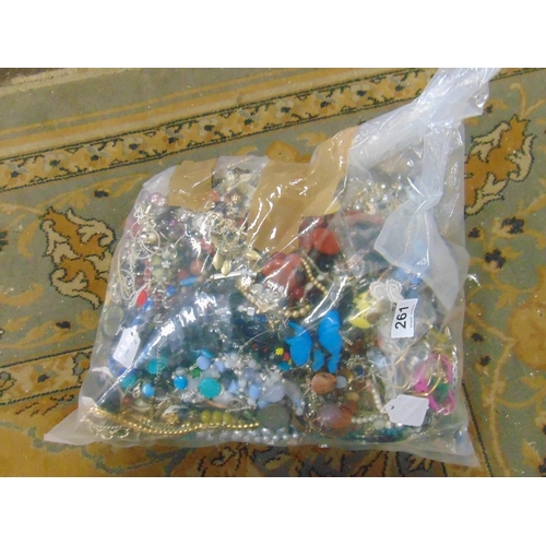 261 - 12 kilo bag of costume jewellery.