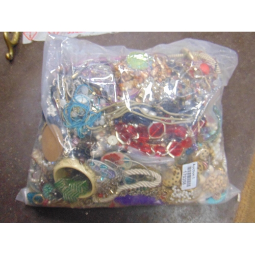 266 - 12 kilo bag of costume jewellery.