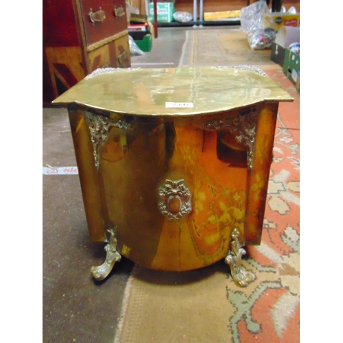 276 - Brass coal box, having lift up lid, embossed decoration and on shaped feet. 13 x 14.5 x 13.5