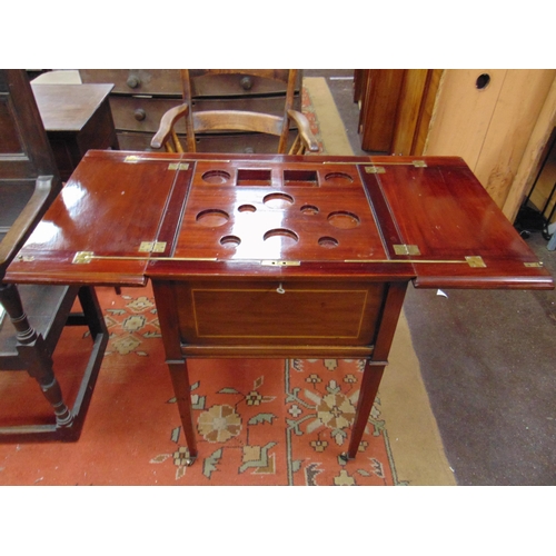 282 - Edwardian inlaid mahogany rise and fall drinks cabinet, the square top opening to reveal a fitted in... 