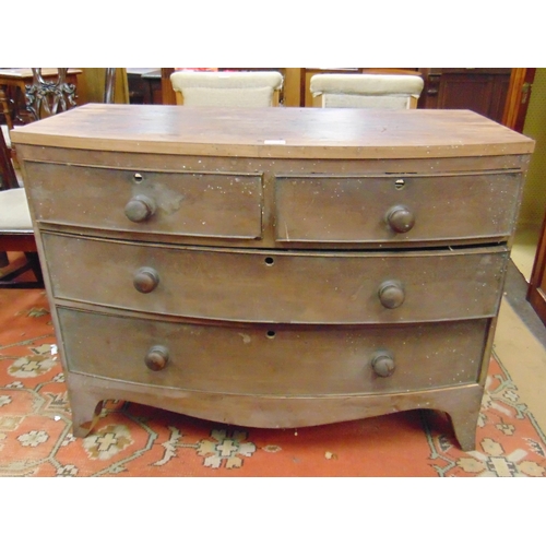 284 - Antique bow front chest of two short and two long drawers with knob handles and on splayed supports ... 