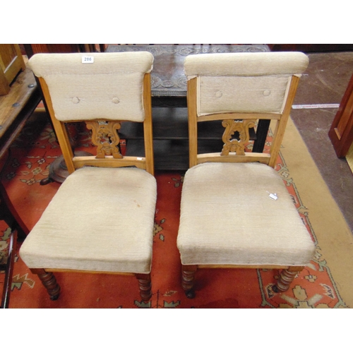 286 - Pair of beech framed nursing chairs, pierced splats, upholstered backs and seats, on turned frontal ... 