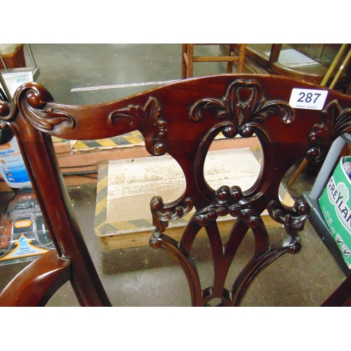 287 - Set of 12 reproduction mahogany dining chairs, shaped tops, pierced backs, drop in seats, on plain s... 