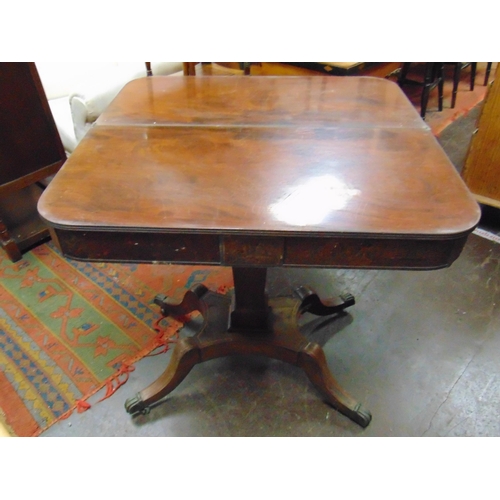 296 - Regency mahogany tea table, D shaped fold over top revealing a polished interior, tapered supporting... 