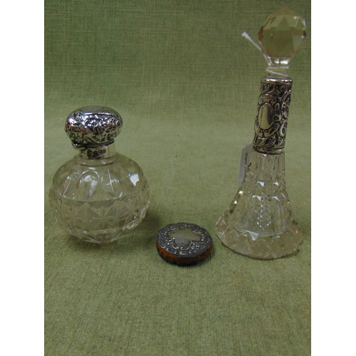 3 - Two silver mounted dressing table jars together with a silver cased pin cushion. (3)