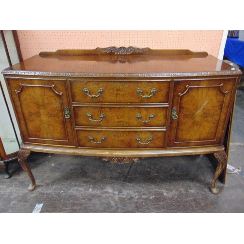 308 - Walnut veneered dining room suite, comprising extending table, four chairs and sideboard.