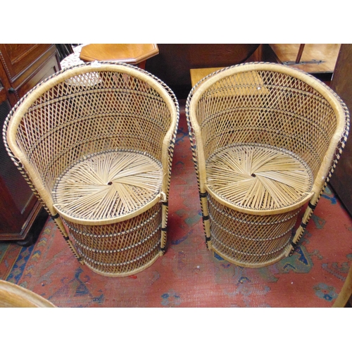 312 - Pair of wicker side chairs.