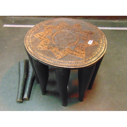 320 - Eastern centre table having Elephant trunk form supports. (af)