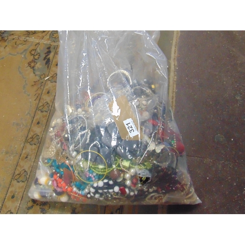 321 - 12 kilo bag of costume jewellery.