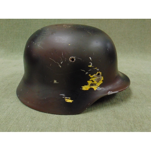 33 - World War II German steel helmet.