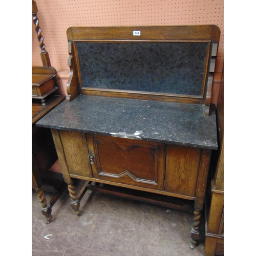 344 - Oak three piece bedroom suite, comprising wardrobe, marble topped washstand and mirror back dressing... 