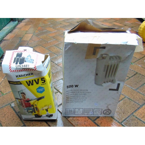 383 - Karcher window vac and a small oil filled heater.