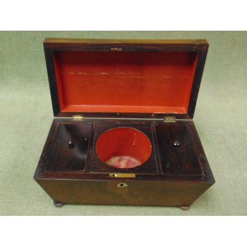 45 - Antique rosewood sarcophagus form tea caddy, having lift up lid and on bun feet. 7 x 12 x 6