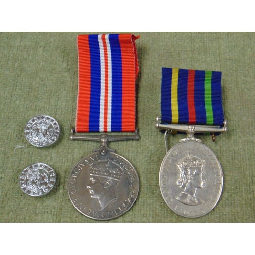 77 - 2nd World War medal together with a QE2 Territorial and volunteer medal.