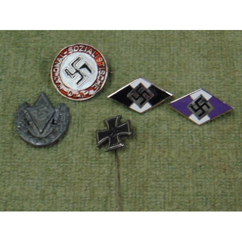 79 - Nazi party badge, 2 Swastika  badges, Iron Cross tie pin and a 1943 Nazi badge.