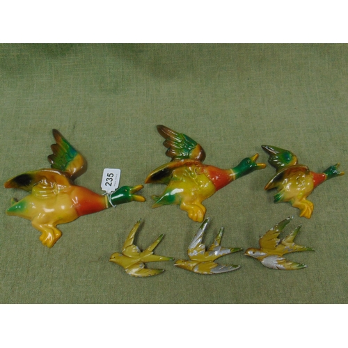 235 - Circa 1930 group of six cast metal flying mallard ducks and swallows.