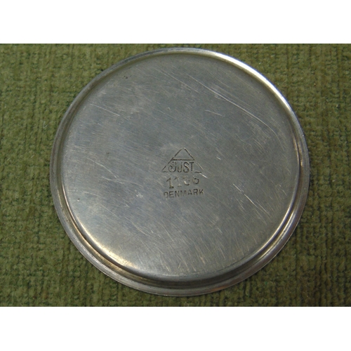 240 - Six 1930's pewter coasters by Just Andersen  of Denmark, each engraved with a stylised animal motif,... 