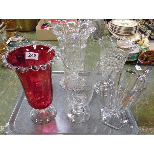 248 - Cranberry glass celery vase together with five other examples. (6)