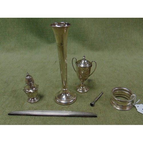 276 - Collection of silver, small two handled trophy, posey holder, pepperette. napkin holder, clasp and a... 