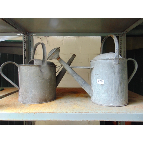 279 - Two galvanised watering cans.