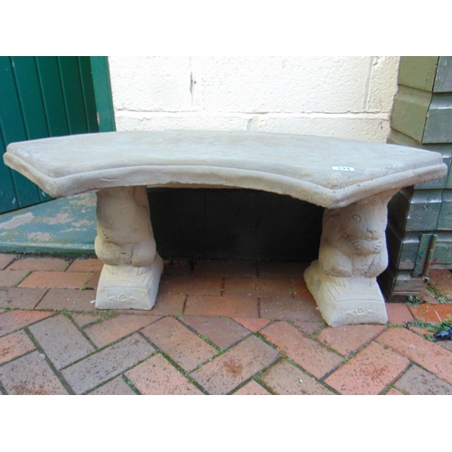 294 - Modern stoneware garden concave bench, having squirrel form supports. 38