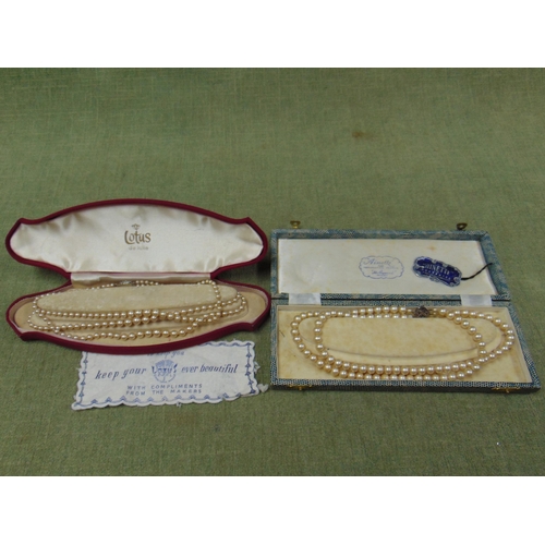 14 - Cased Lotus de lux pearl necklace and one other cased example. (2).