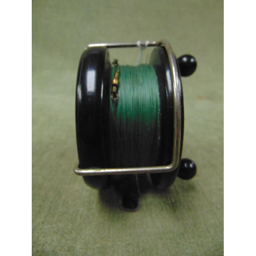 175 - Allcock Aerialite bakelite cased fishing reel.