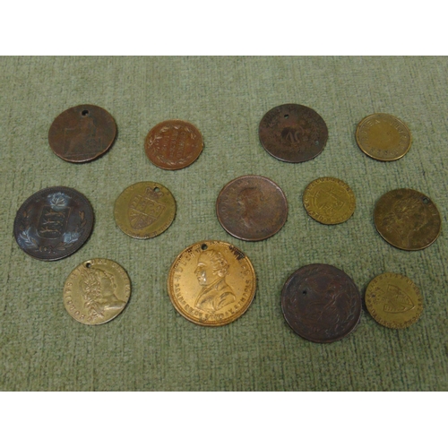 21 - Collection of gaming tokens and medallions.