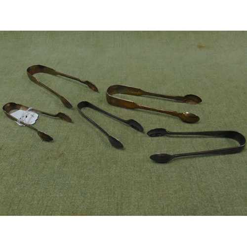 3 - Three pairs of silver sugar tongs, 3.7 ozt and two pairs of plated tongs.