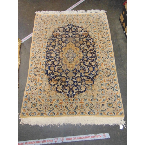 385 - Blue and fawn ground rug, having floral decoration, 62 x 45