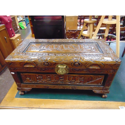 442 - Small camphor wood chest, having lift up lid , traditional decoration and on pad feet. 14 x 27 x 12