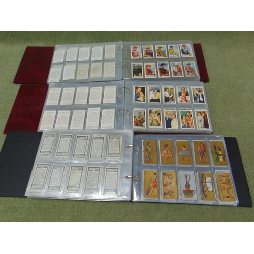 47 - Three cigarette card albums and contents.