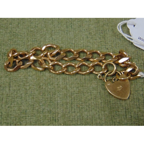 7 - 9ct gold curb link bracelet, having heart shaped padlock, 23 gms.